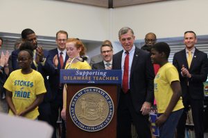 Governor Carney with students and advocates at an education press conference.